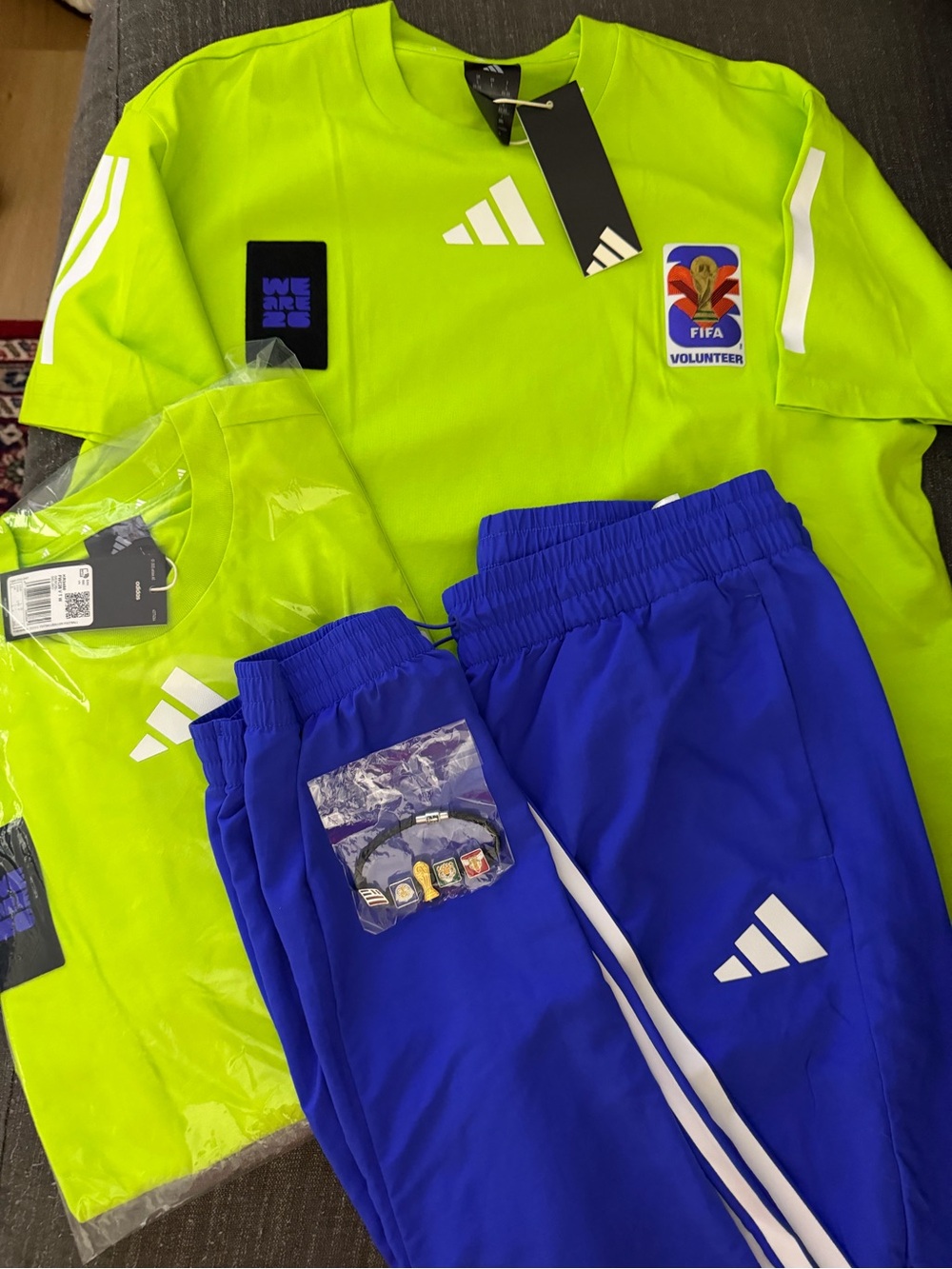 FIFAofficial volunteer shirts 2 NWT shirts & 1 (Jogger pants, worn once Braclet